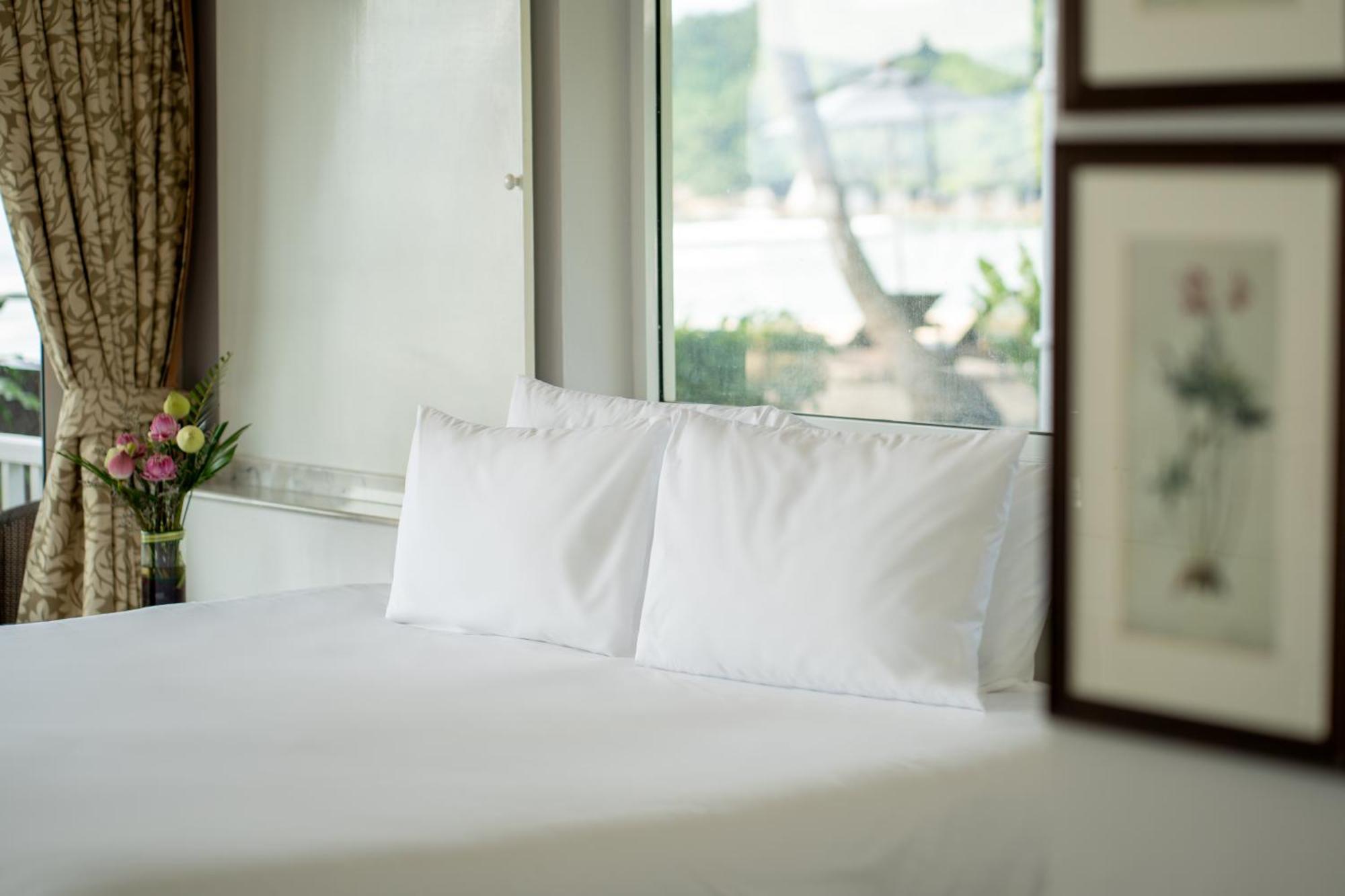 Thavorn Beach Village Resort & Spa Phuket Kamala Beach Esterno foto Pillows on a bed